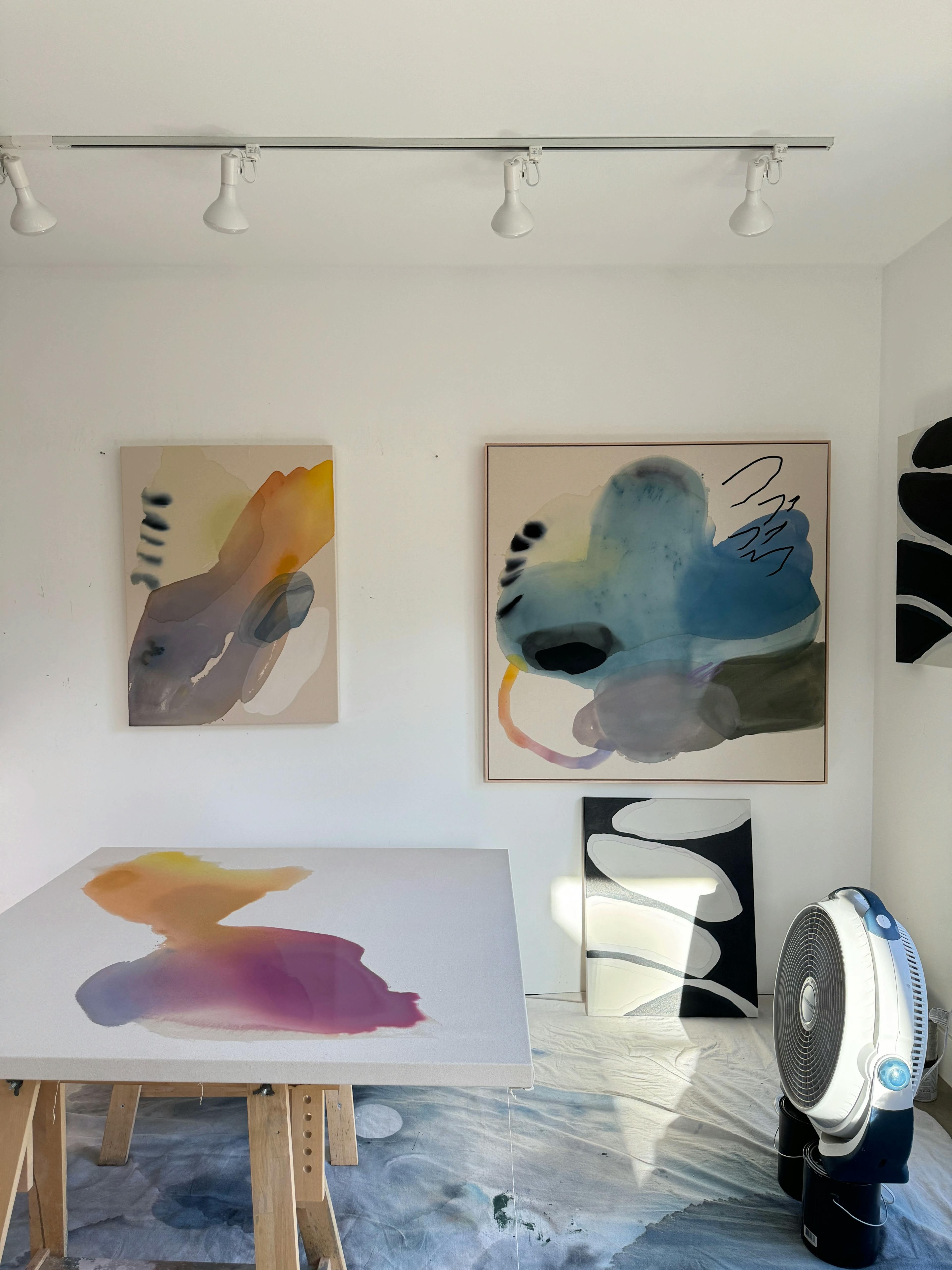 In-progress colorful, gestural brushwork paintings in artist Karina Bania's studio.