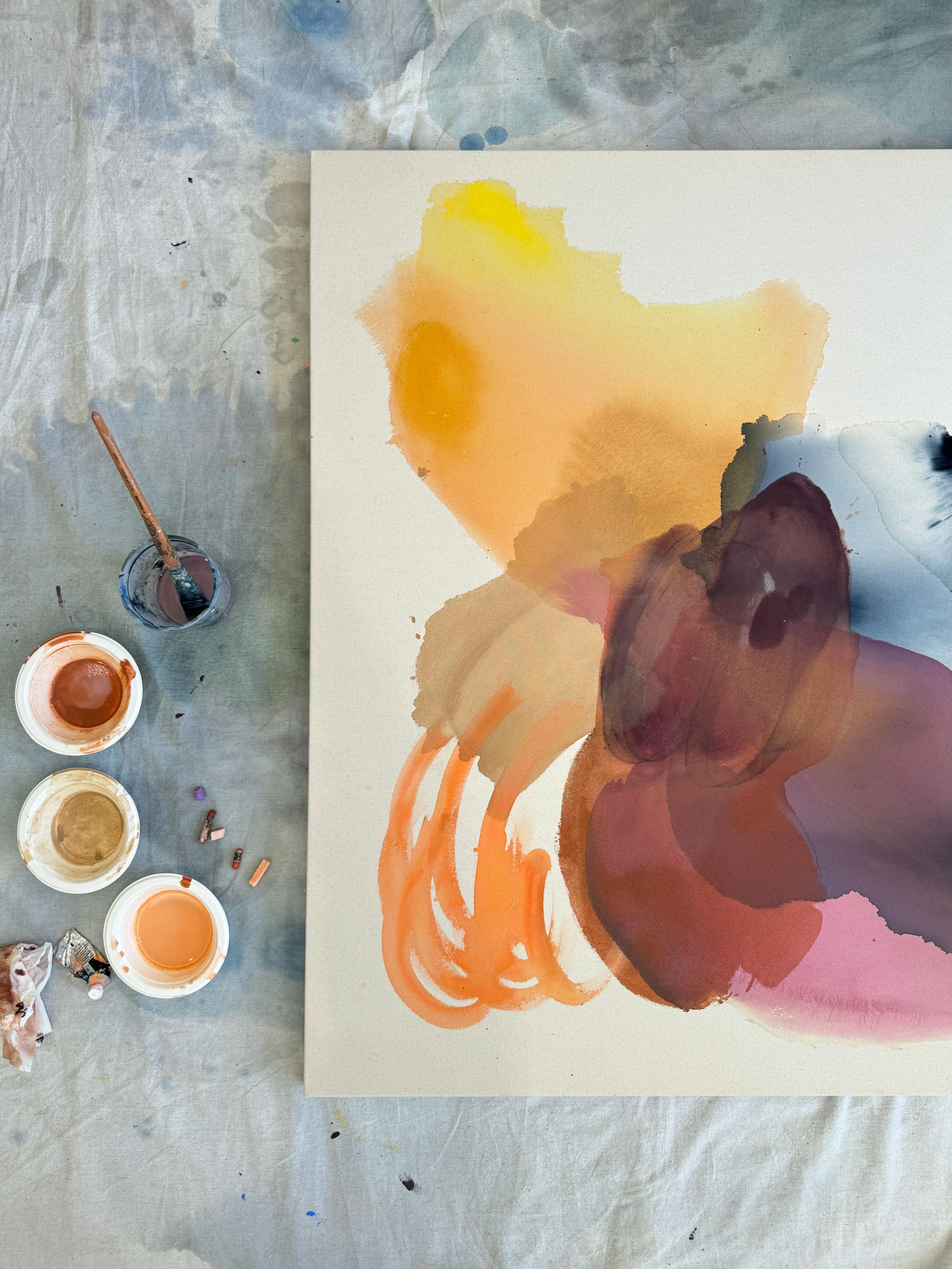In-progress orange and pink gestural painting on canvas by Karina Bania.