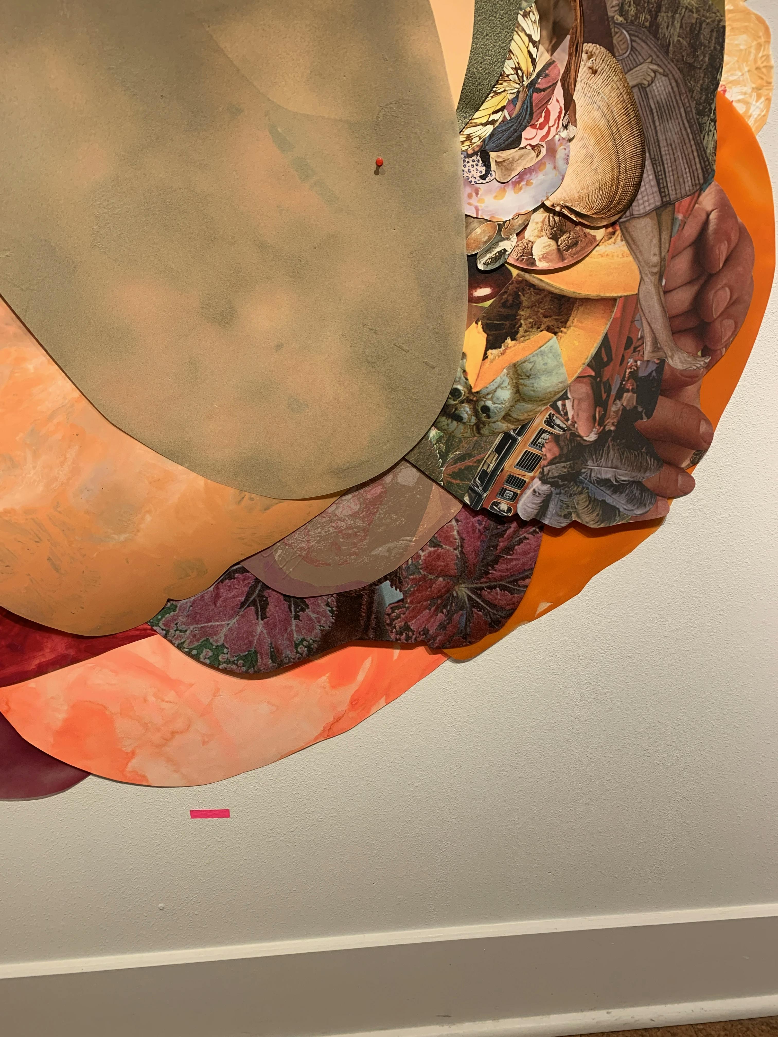 A close-up of an oversized, site-specific collage installed on a white wall by artist Xochi Solis.