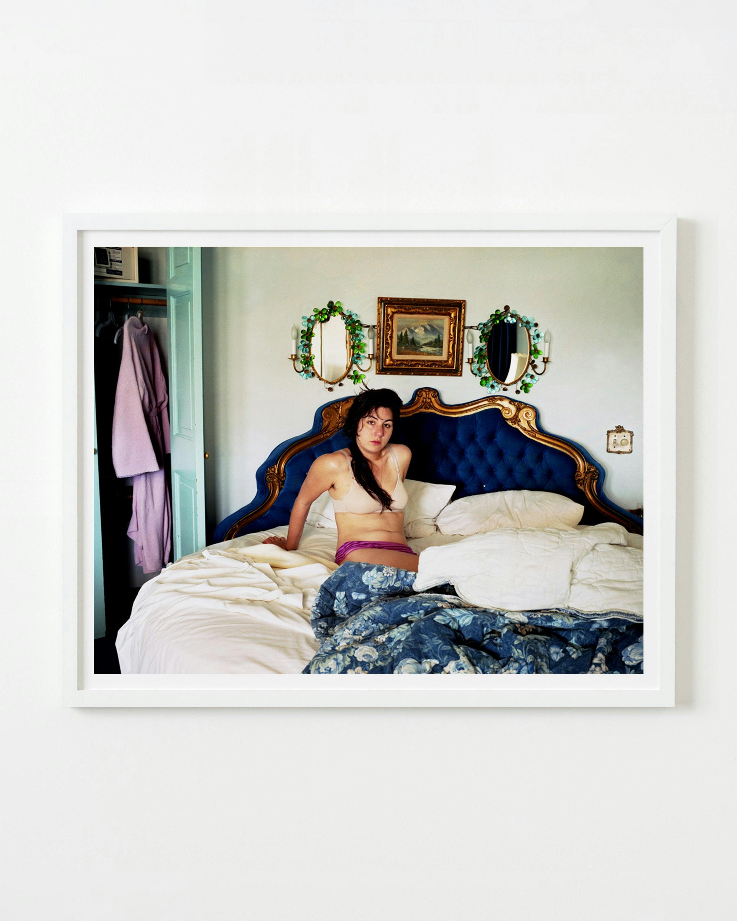 Photography by Nick Meyer titled "Alexis in a Round Bed, San Luis Obispo".