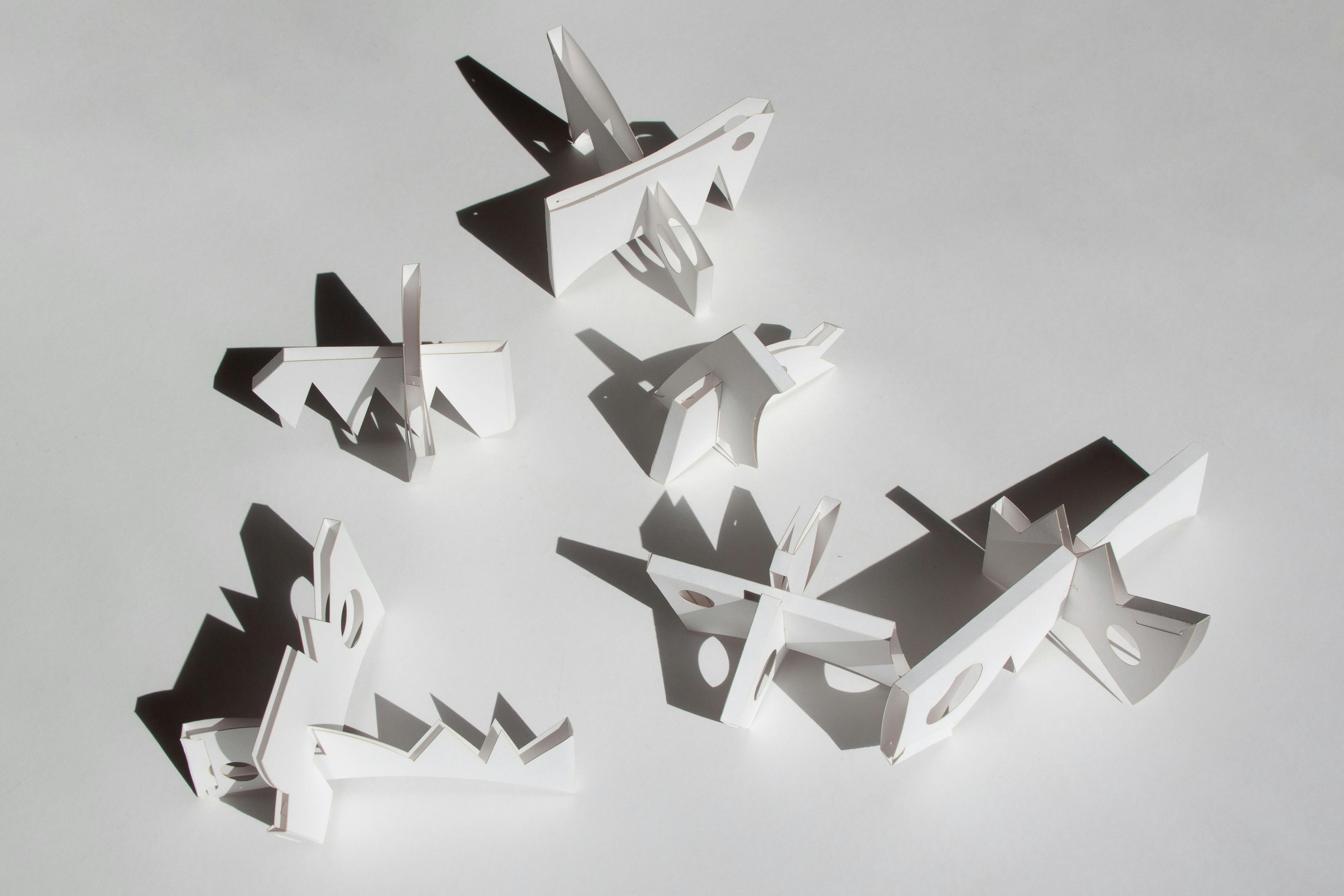 Sculpture by Fitzhugh Karol titled "To and From (Paper Maquettes)".