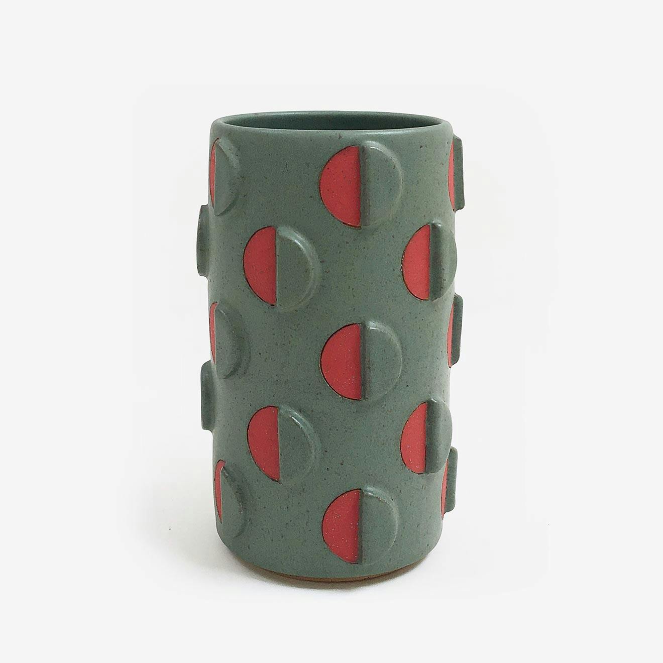 Sculpture by Matthew Ward titled "Split Polka Dot Vase with Relief".