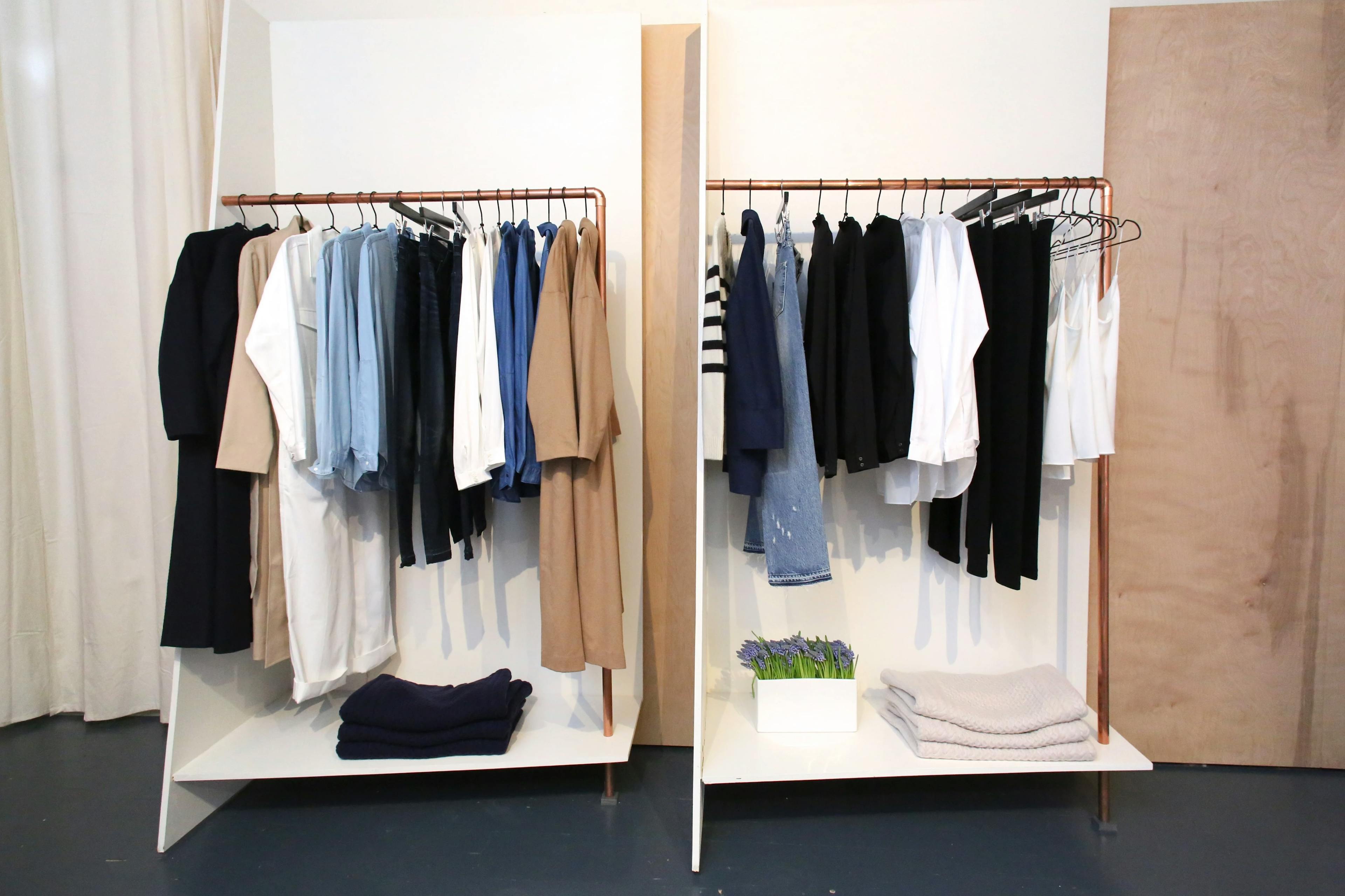 Clothing rack with a variety of different garments at AYR.