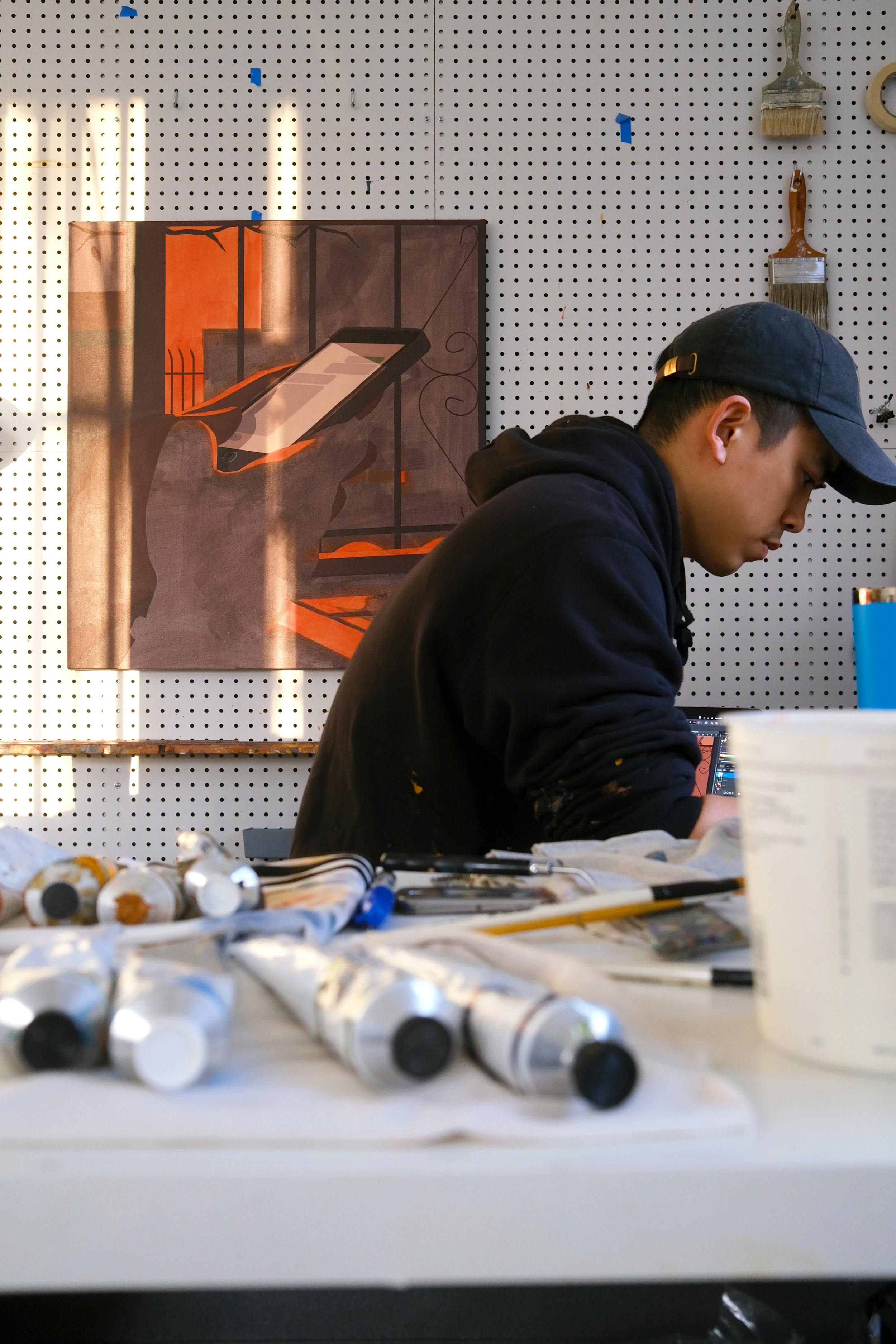 Artist Adrian Kay Wong in his studio. 