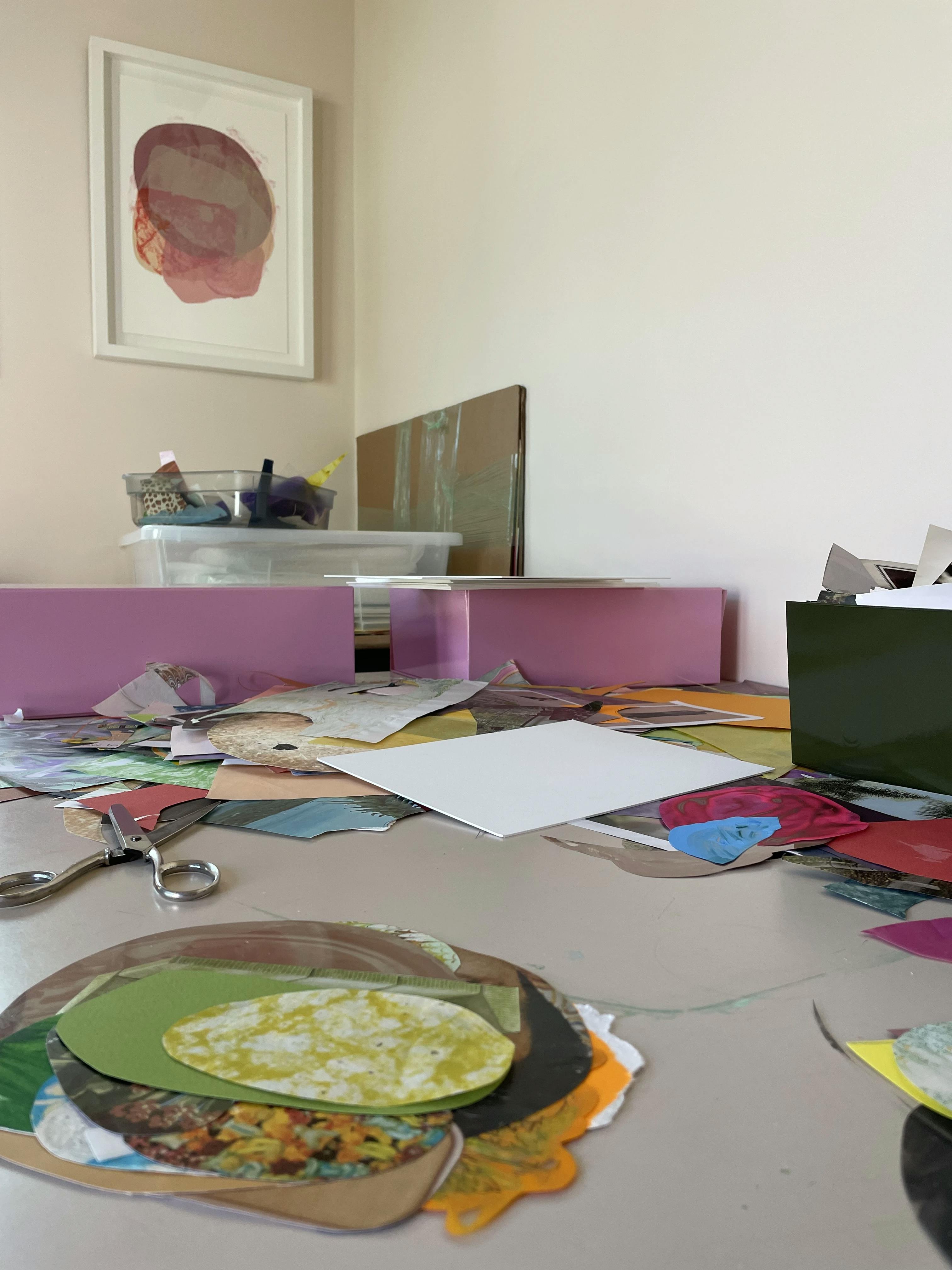 Mixed-media collages in progress within artist Xochi Solis' studio.