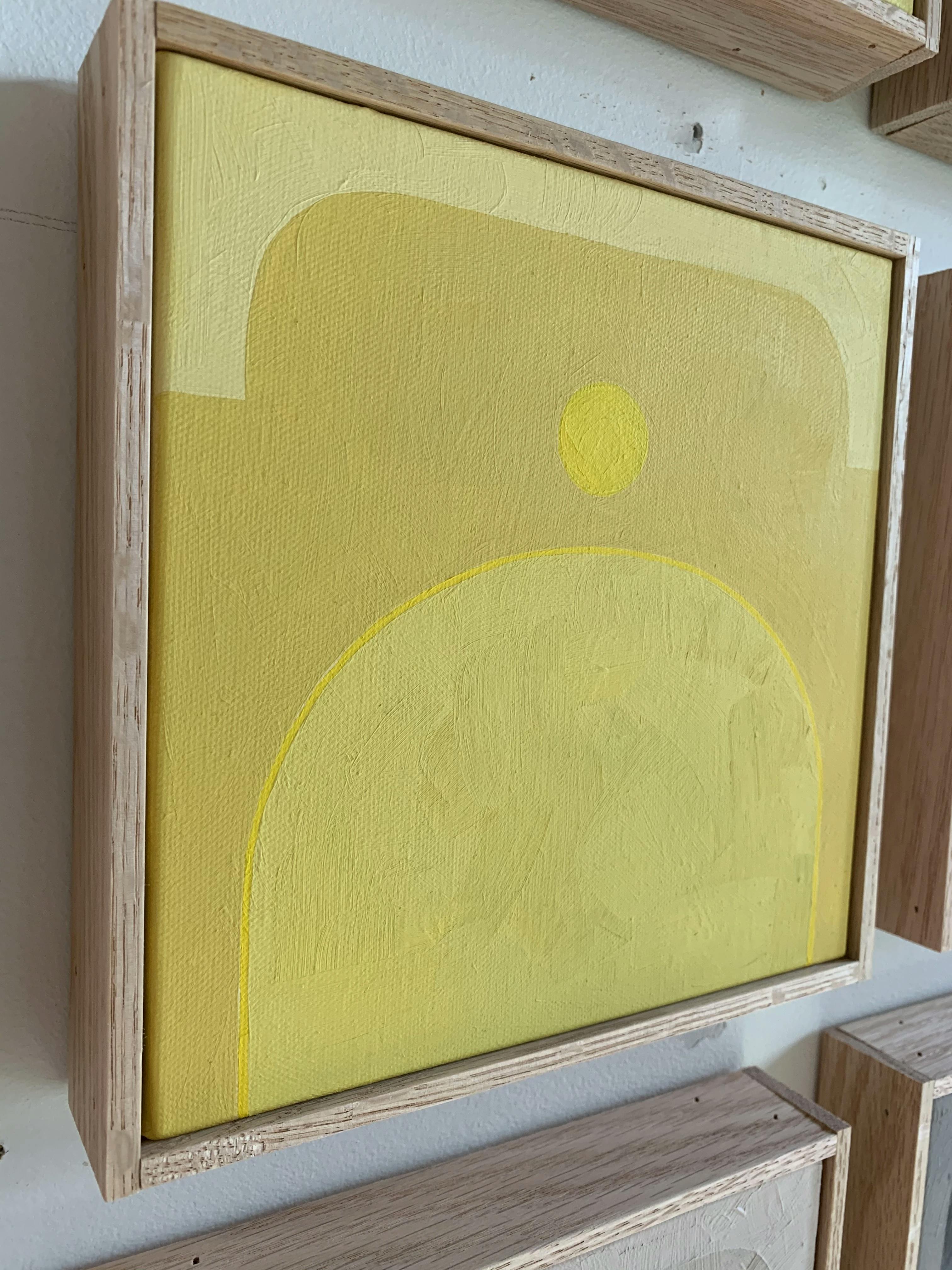 A close-up of a minimalist yellow painting by artist Carla Weeks.