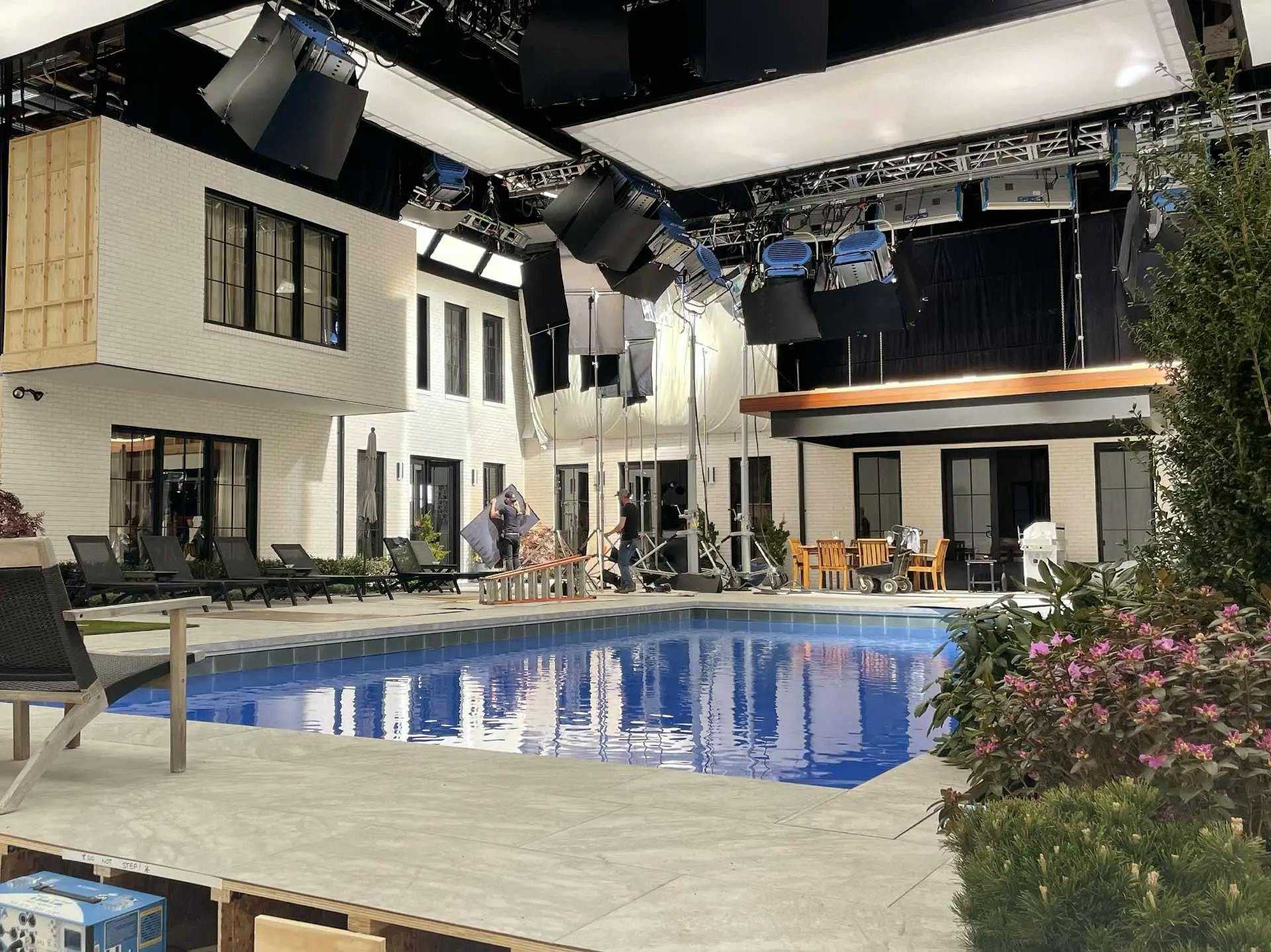 A constructed film set of a white modern house with a pool for the Netflix film, Leave the World Behind.