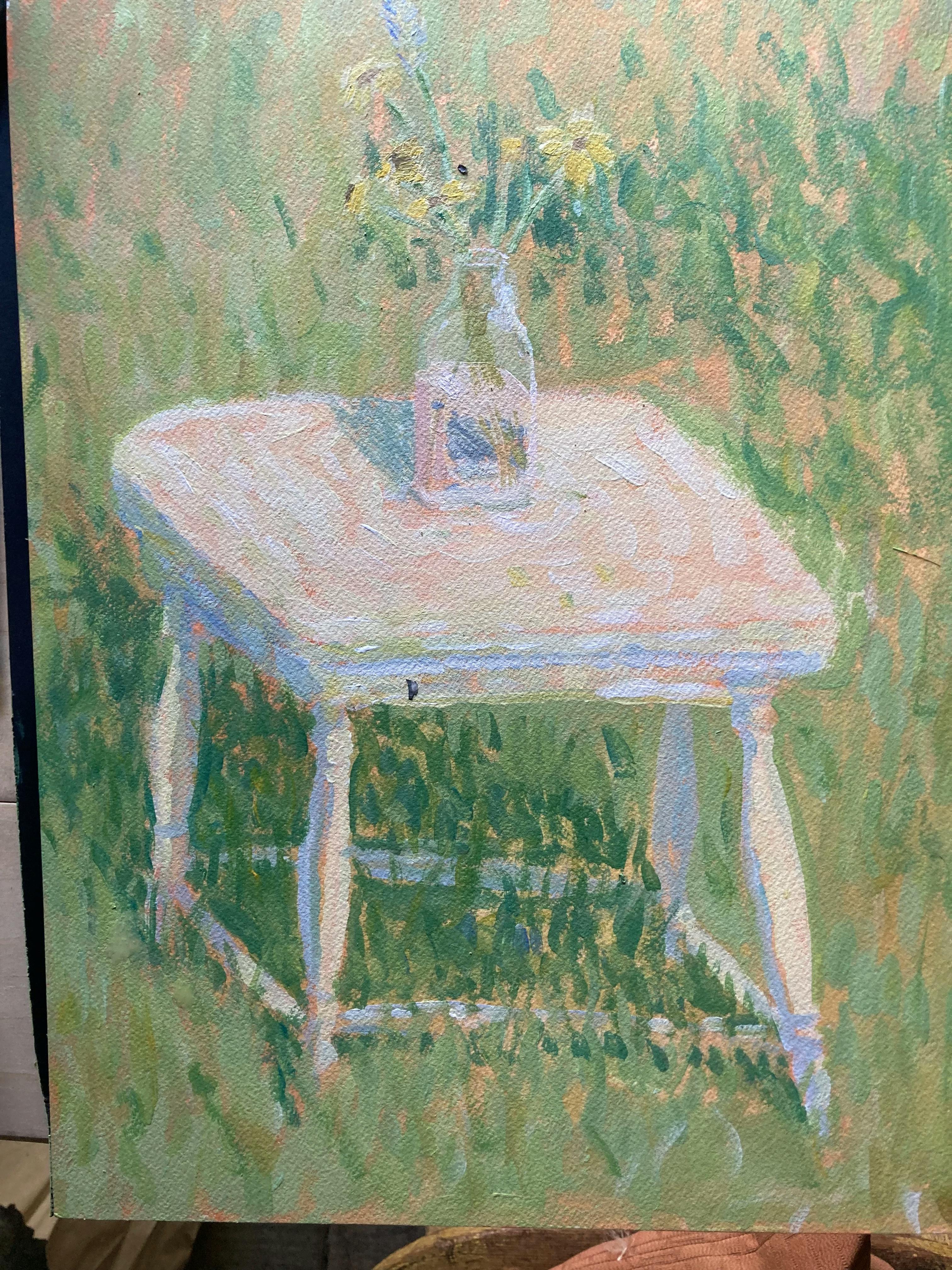 Close-up a painting by artist Jackson Joyce of a white stool in a grassy field with a vase of yellow flowers on top.