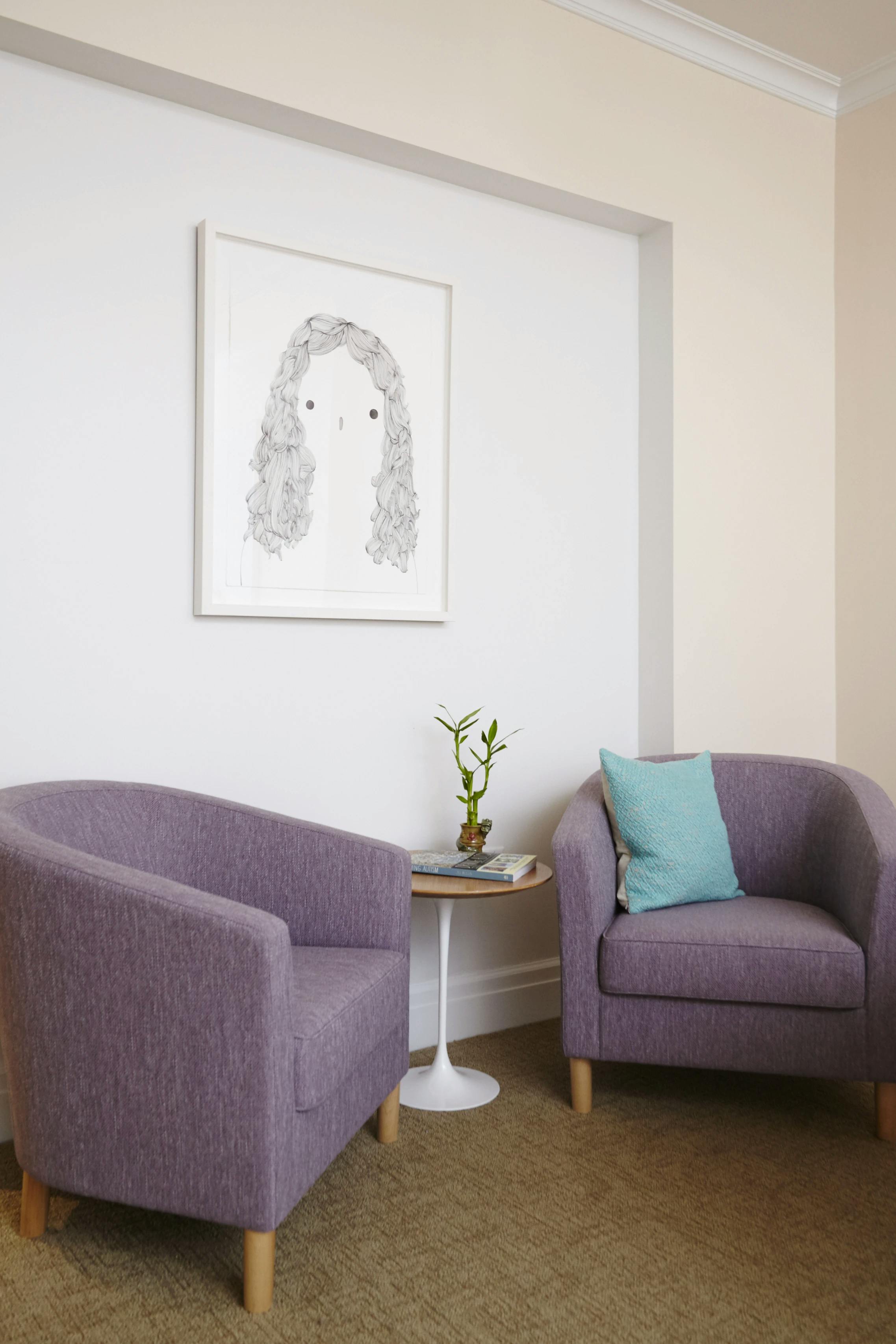 A framed hair drawing by Rebeca Raney at Felicity House.