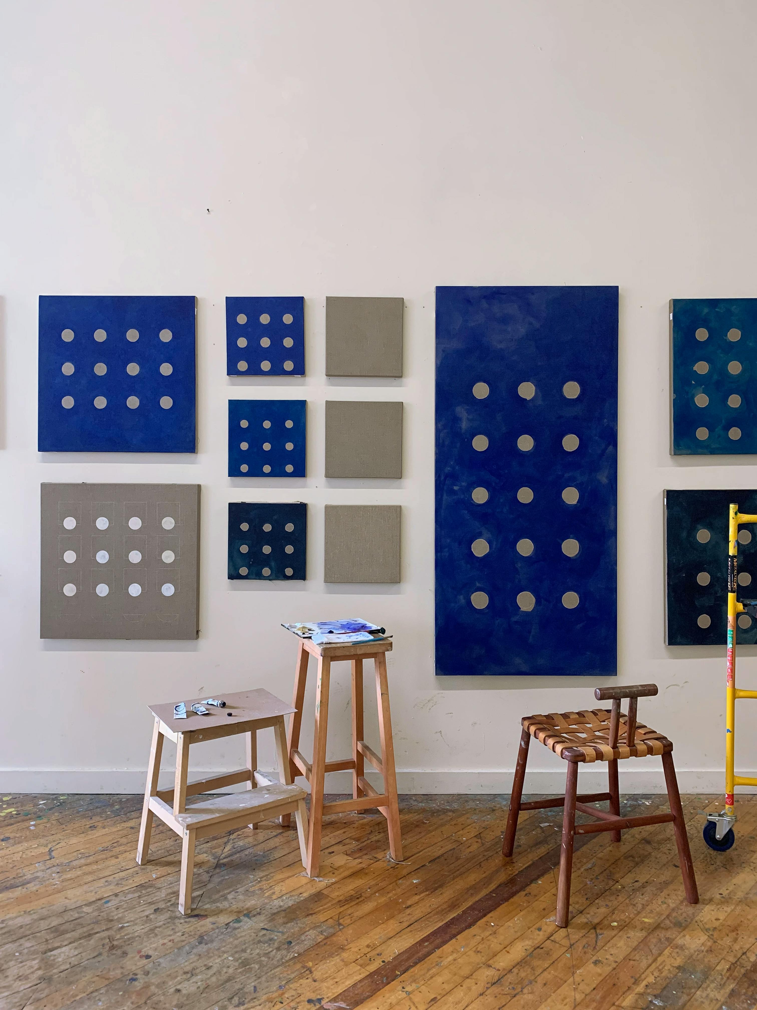 Geometric, gray and blue paintings on canvas by artist Carla Weeks.