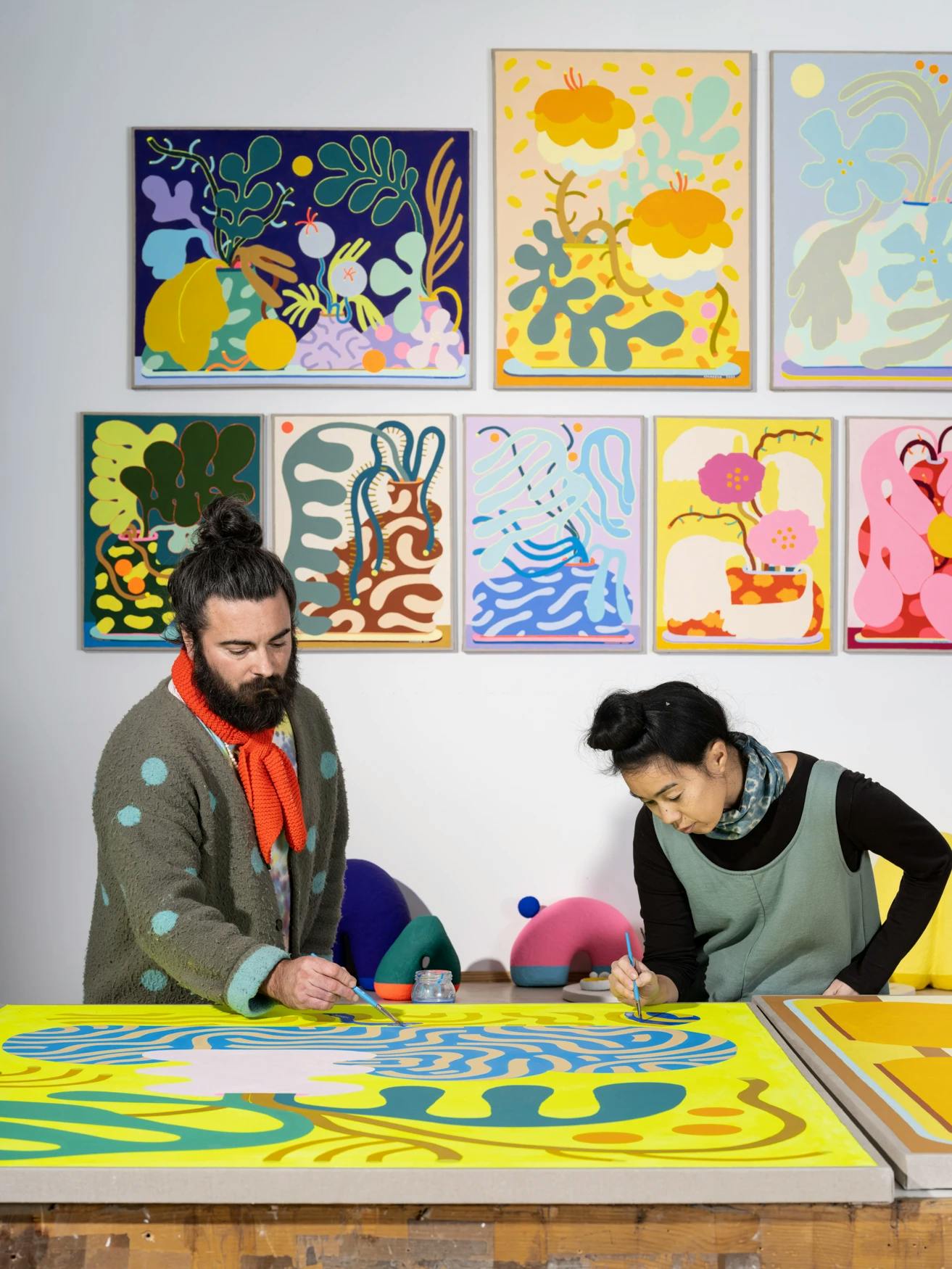 Artist duo CHIAOZZA working in their studio.