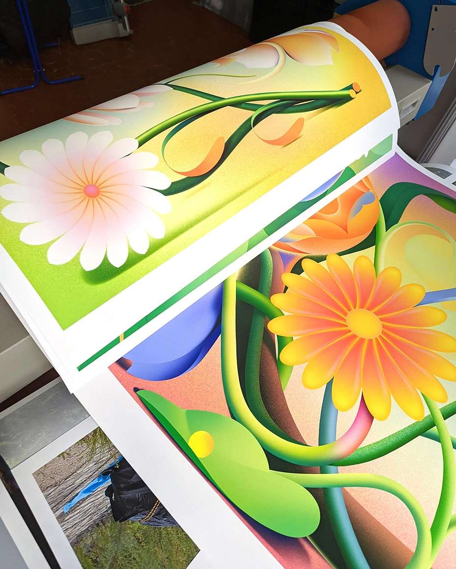 Abstract floral prints by Roche coming off the press.
