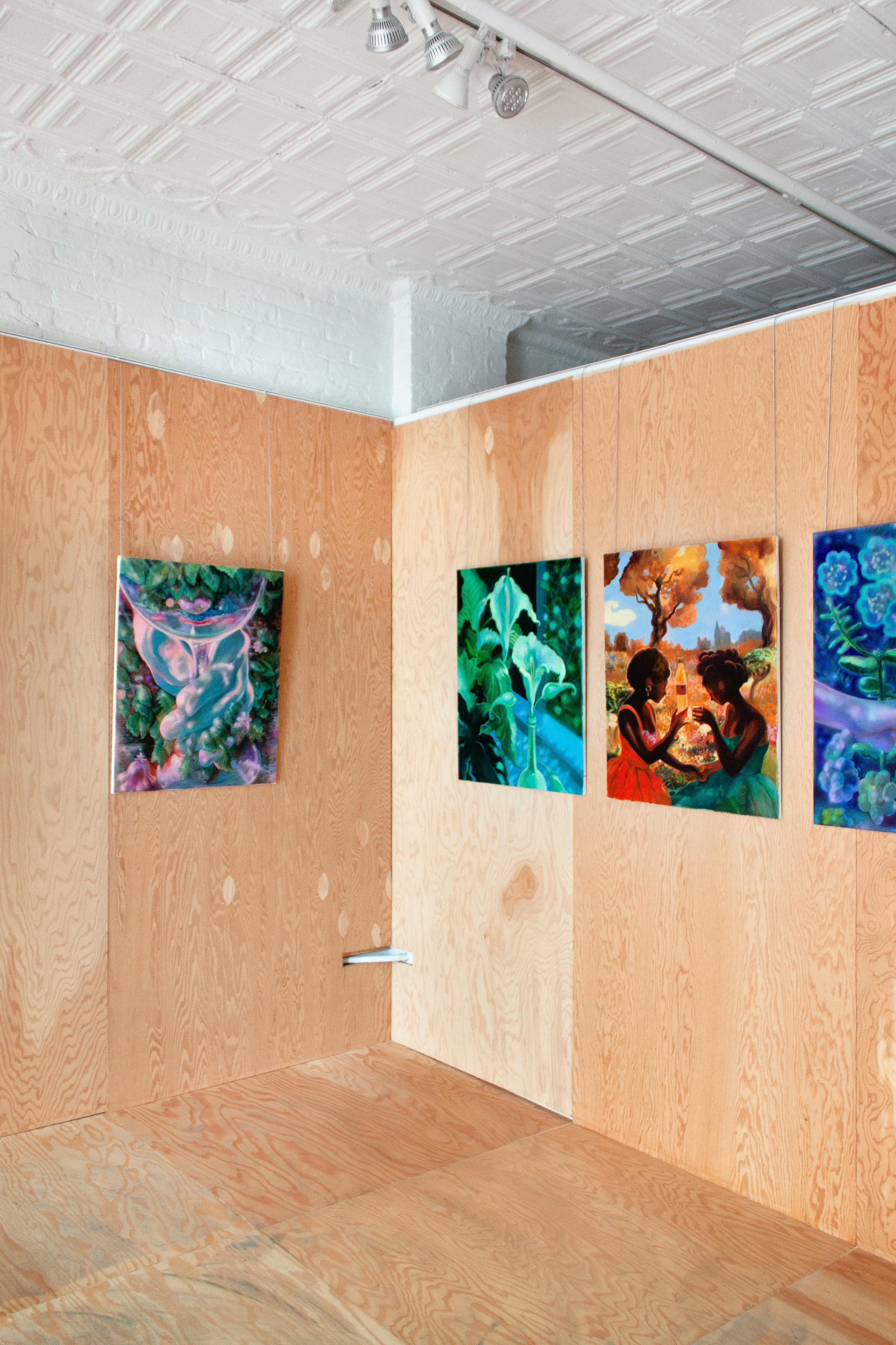 Paintings by Nefertiti Jenkins installed at Uprise Art for exhibition Ghosts in the Garden.