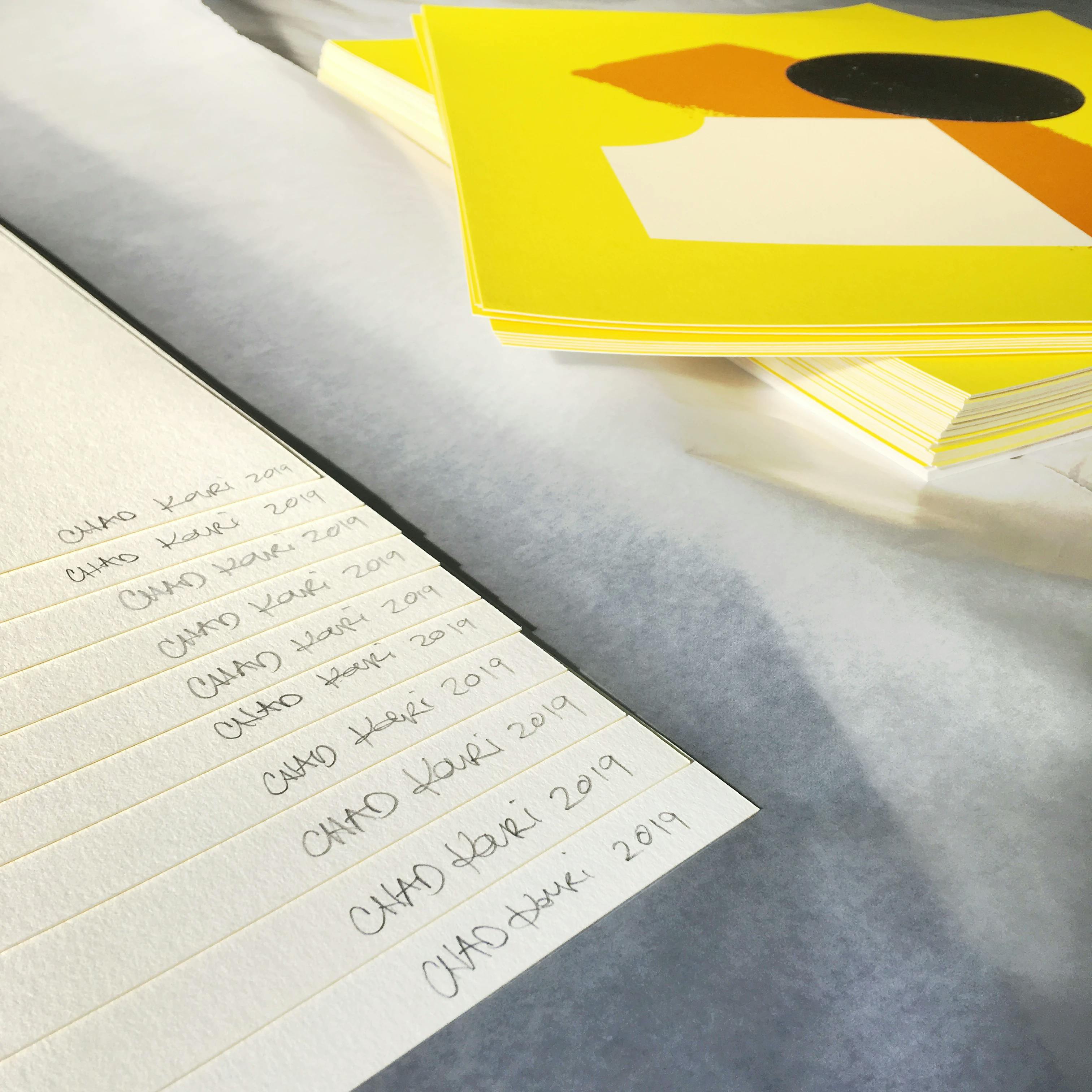The back of Chad Kouri's print Opportunity for Reflection (Yellow) with artist signatures.