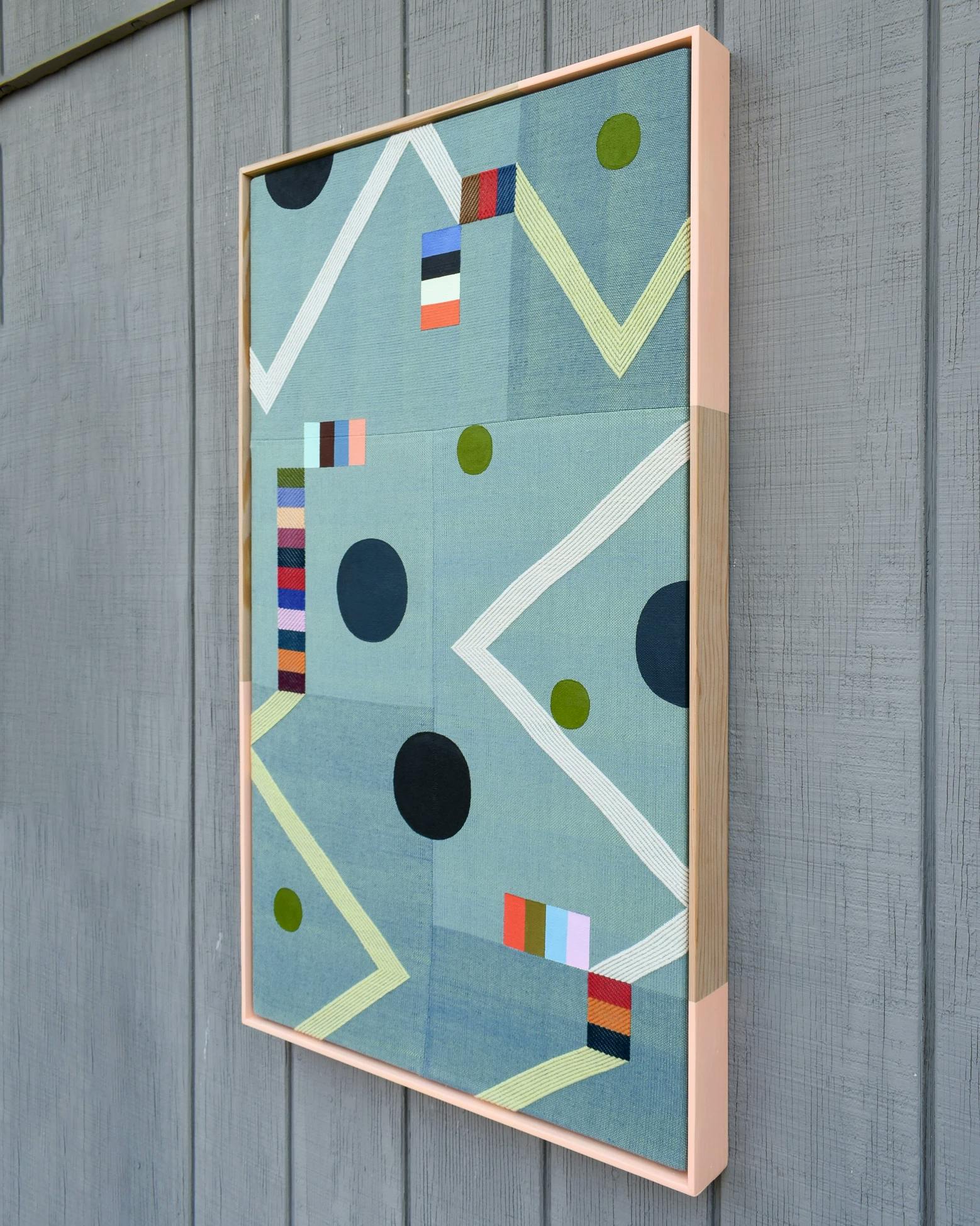 Abstract teal artwork with handwoven diagonals and circular shapes by artist Sarah Sullivan Sherrod.