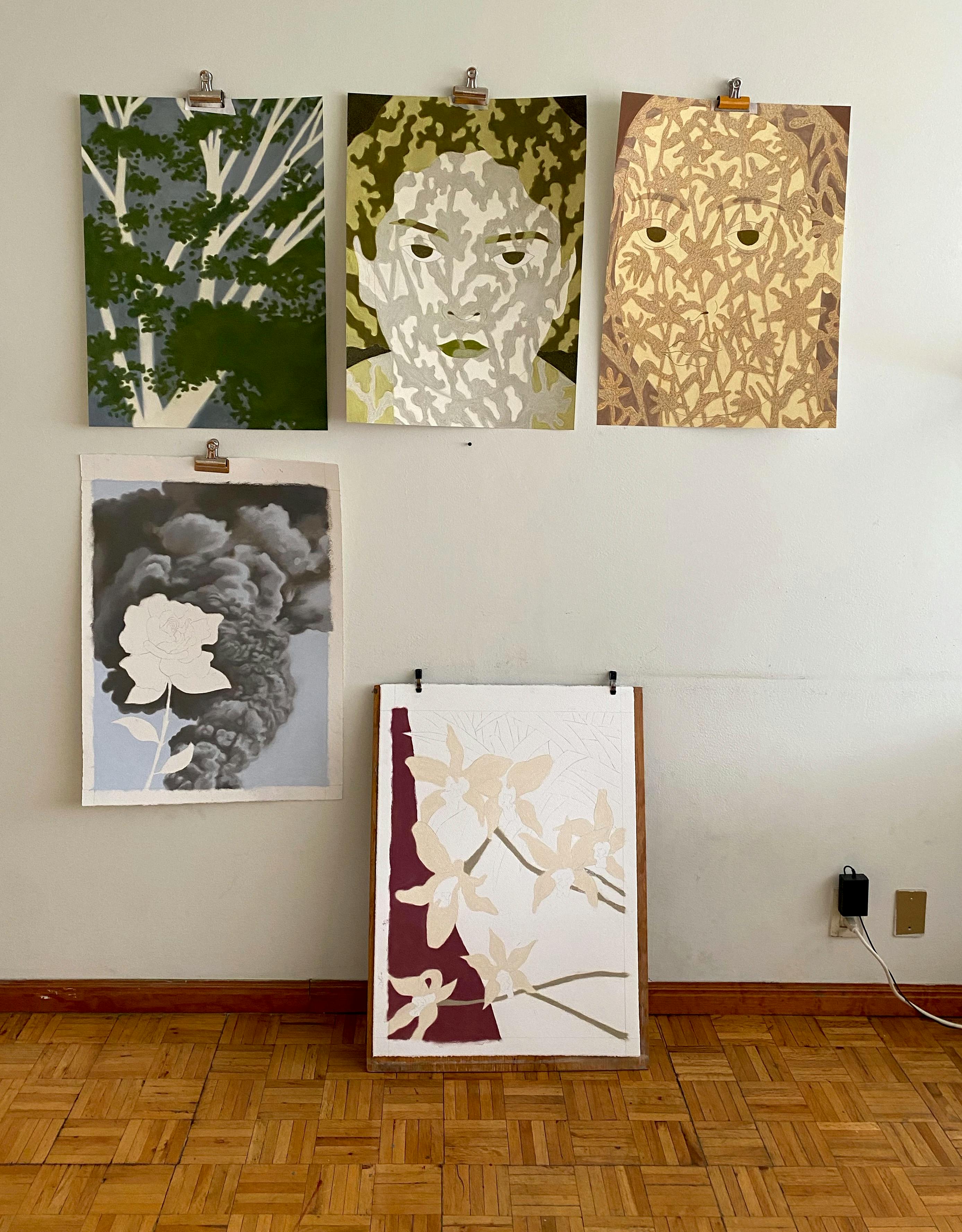 Five pastel drawings, two figurative and three of nature, by artist Rachel Levit Ruiz installed on a white wall in her studio.